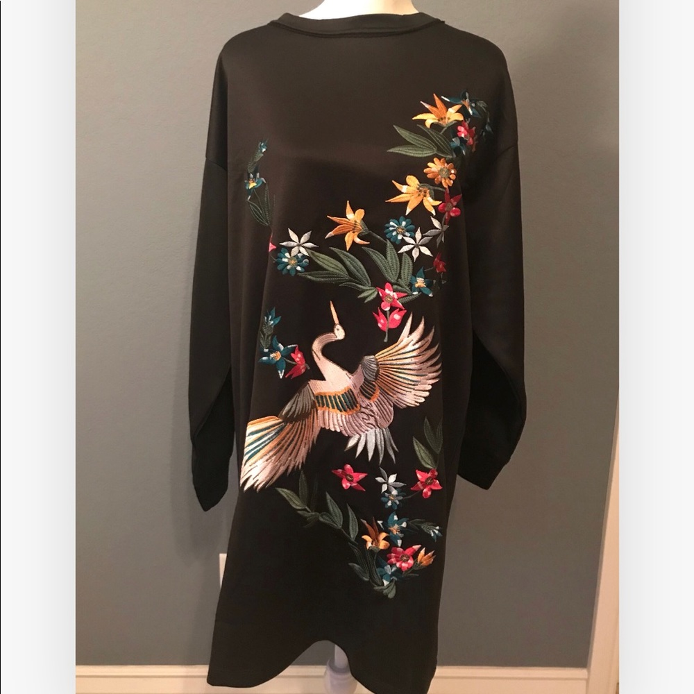 Embroidered sweater dress.